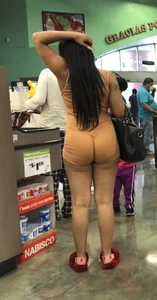 Latina with hard nipples and a big booty in tight spandex shorts outfit
