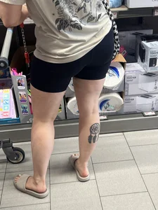 Milf in black biker shorts and flip flops
