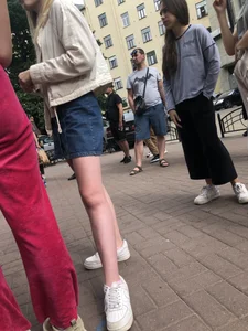Street Candid Girl in a Denim Skirt and Sneakers Hot Legs Creepshots