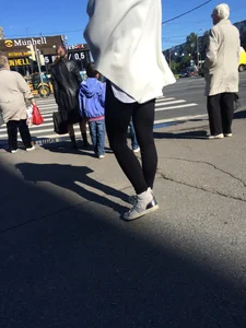 Blonde Girl With Fit Muscular Legs in Tight Black Jeans and Sneakers on a Crosswalk  - Street Creepshots Collection