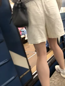 Subway hottie wearing shorts