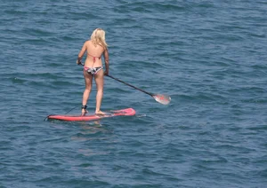 Candid surfer babes on the beach and in bikinis