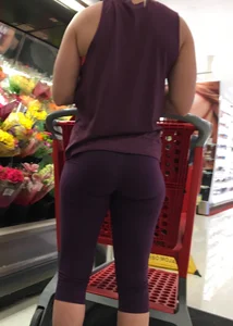 Blonde bubble butt babe shopping in tight purple leggings