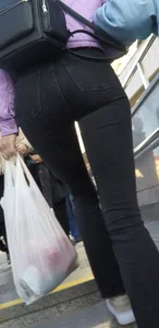 Juicy ass in black tight jeans and nice skinny legs street closeups