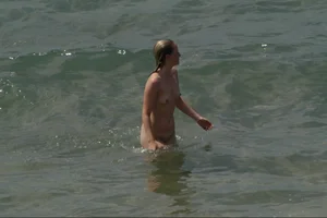 Girls on a nude beach in Sitges, Spain