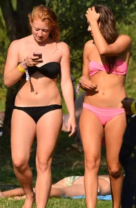 Various sexy girls in bikinis at the park