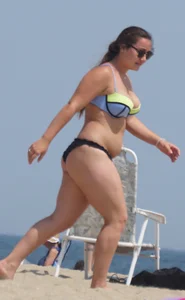 Thick girl on the beach in a bikini