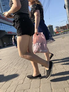 Candid teen in shorts with nice legs and booty street pics