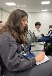 College Vpl Latina In Dark Grey Leggings Going Up The Stairs