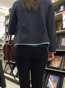 Sexy lady shopping at Walmart in leggings
