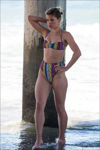 Beach girl with an incredible body in a funky looking bikini