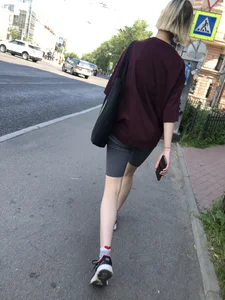Hot candid chick with very long slim legs wearing spandex shorts walking down the street creepshots