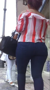 Lady walking in tight jeans with a big booty and slight vpl