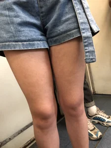 Girl in Blue Denim Shorts and Flats Standing in Subway Train - Nice Legs Closeup