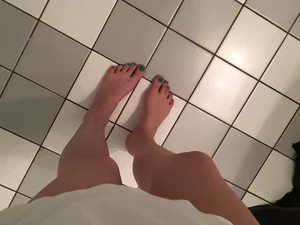 Bare Feet on the Floor and Skinny Legs Selfie