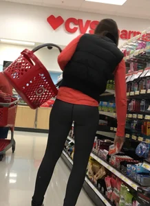 Skinny and tall milf shopping at Target in tight leggings