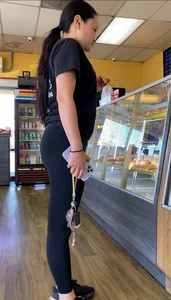 Fit Asian in leggings at the donut shop