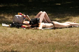 Creepshots of some girls in the park getting some sun in bikinis