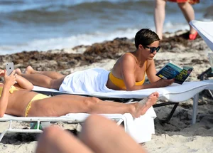 Frankie Bridge nip slips in a bikini on the beach