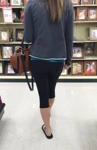Sexy lady shopping at Walmart in leggings