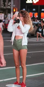 Cheeky sexy babe tourist out in tiny green jean shorts