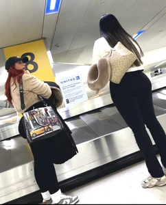 2 pretty ebony juicy booty at airport and bending over