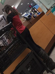 Brunette with a tight butt, boots, and a VPL