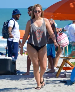 Chubby white girls in bikinis on the beach