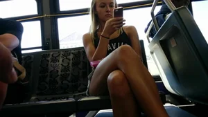 Candid Crossed Legs in a Public Bus Photo