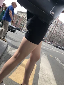 Great legs and booty in spandex shorts of a street candid girl crossing the street