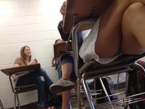 College Girl Sitting With Crossed Legs Classroom Under the Desk Candid Photo