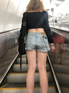 Tall Candid Teen Girl in Denim Shorts and a Top With an Injured Knee Subway and Street Creepshots - Hot and Muscular Long Legs