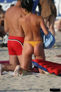 Beach voyeur girls in bikinis, thongs and topless
