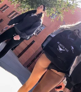 Thin sorority girl with cheeks out