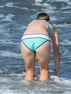 Sexy beach blonde snorkeling in bikini