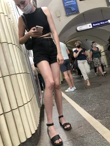 Amazing Hot Skinny Candid Girl in Shorts And Sandals Touching Her Leg on a Subway Station Creepshots Gallery