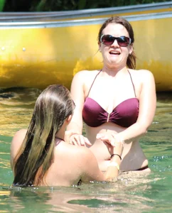 Two big boobed bikini babes in maroon bikinis