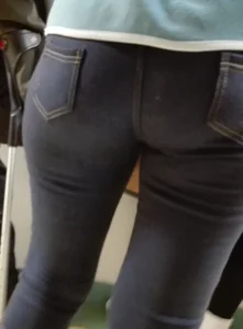 Wide ass on a redhead in tight jeans