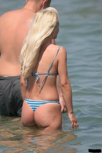 A bunch of sexy beach voyeur babes in bikinis, thongs and topless