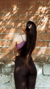 Non-candid hottie in a crop top and leggings