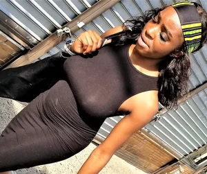 Sexy braless ebony babe in tight skirt with pokies