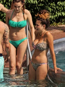 Hot big boobed girl in bikini at the pool