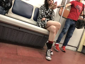 Cute Skinny Teen in Knee-Socks And Shorts Sitting With Crossed Legs in a Subway Train Creepshots Gallery