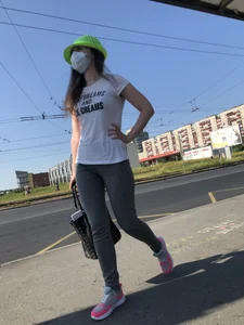 Nice candid girl wearing tight grey sweatpants, a mask and a hat