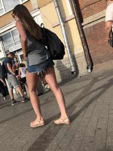 Girl in Denim Mini Shorts and Sandals With Sexy Legs And Feet Street and Subway Photos