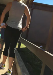 Blonde with a sexy round ass in tight leggings walking