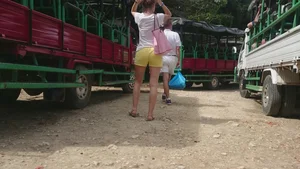 Milf in yellow shorts with vpl and a wedgie
