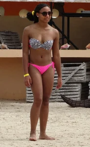Sexy black girl in bikini and short shorts with a cute friend with braces