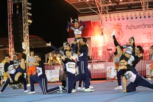 Bunch of athletic Thai cheerleaders at a competition