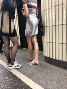 Nice candid legs in black pantyhose in a subway train